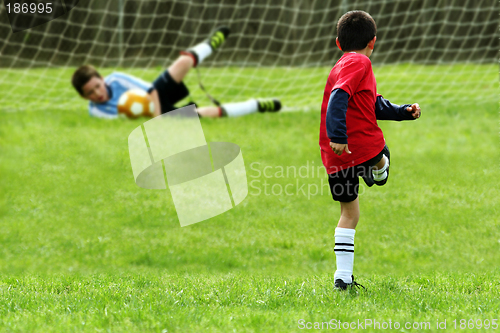 Image of Boys Playing Soccer