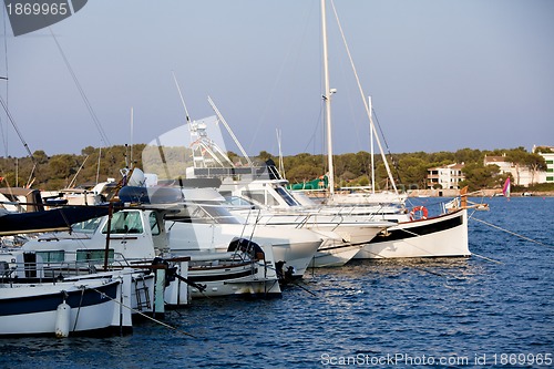 Image of fishing boat in summer outside in sea at harbour