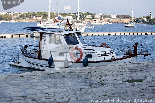 Image of fishing boat in summer outside in sea at harbour