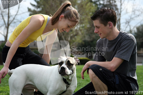 Image of Teens with a dog