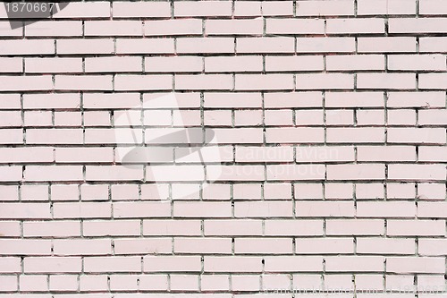 Image of pink painted brick wall