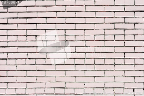 Image of pink painted brick wall
