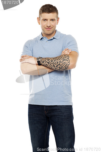 Image of Casual man with artistic tattoo drawn on hand