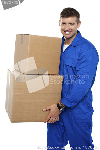 Image of Relocation assistant staff carrying cardboard boxes