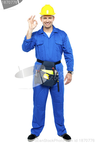 Image of Keep up the good work. Repairman gesturing