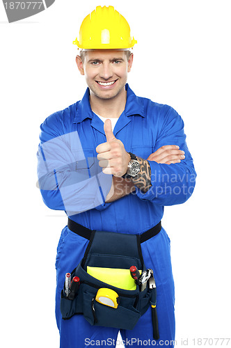 Image of Young industrial contractor showing thumbs up