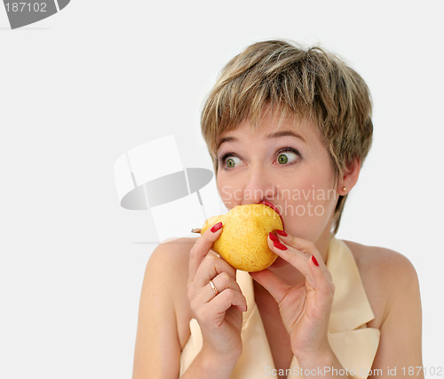 Image of Funny girl with a pear