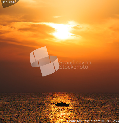 Image of Silhouette Boat on sunrise