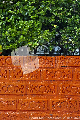 Image of pink painted brick wall