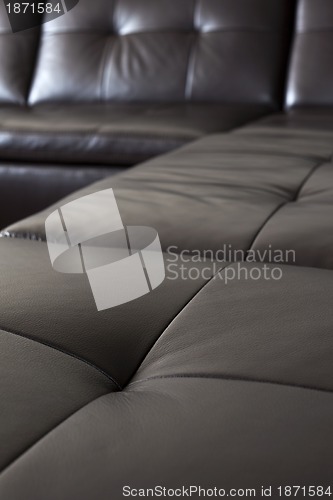 Image of Black leather sofa