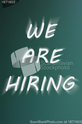 Image of We are hiring - written on a green chalkboard background