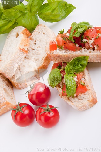 Image of deliscious fresh bruschetta appetizer with tomatoes isolated