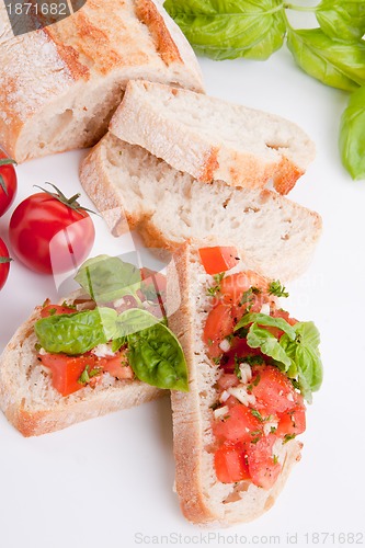 Image of deliscious fresh bruschetta appetizer with tomatoes isolated