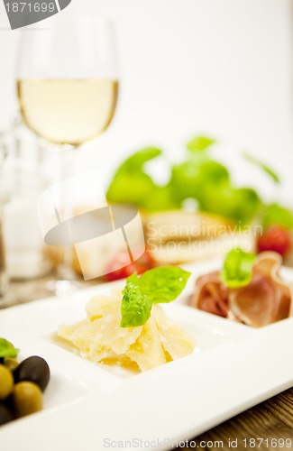 Image of deliscious antipasti plate with parma parmesan olives 