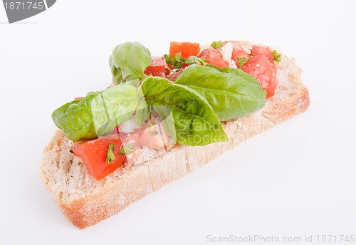 Image of deliscious fresh bruschetta appetizer with tomatoes isolated