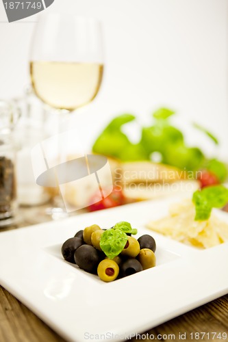 Image of deliscious antipasti plate with parma parmesan olives 