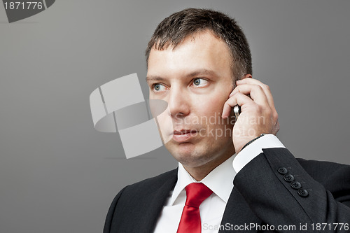 Image of businessman on mobile phone