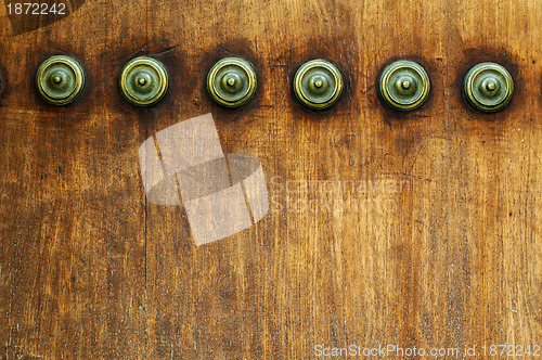 Image of Ornaments on a wooden door