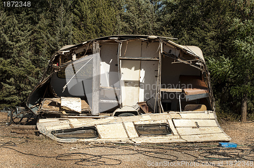 Image of Old broken trailer caravan