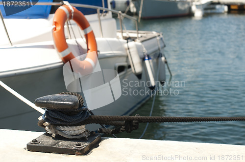 Image of Yacht docked in harbor