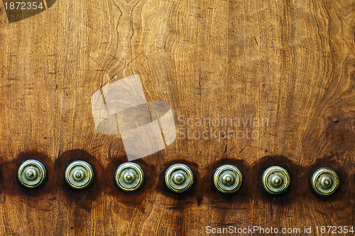 Image of Ornaments on a wooden door