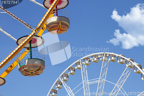 Image of Ferris wheels in an amusement park