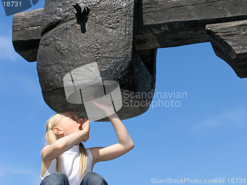 Image of Girl under large hammer