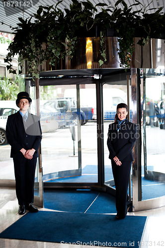 Image of Door man with receptionist at the entrance