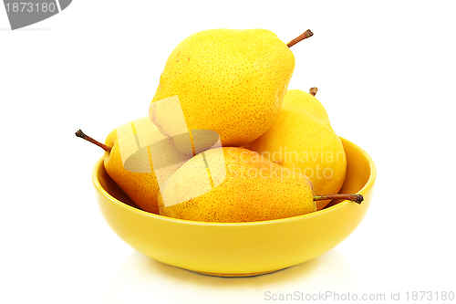 Image of Four ripe pears in the yellow bowl.
