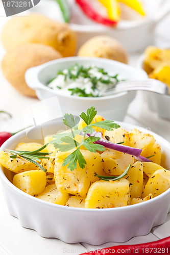 Image of Baked potatoes with sour cream