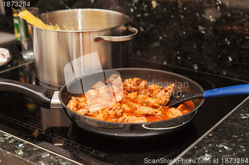 Image of Cooking meat balls with pasta