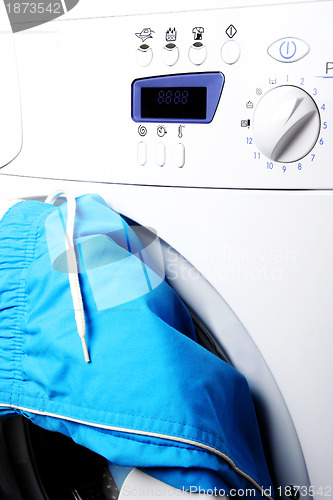 Image of Trousers and laundry.