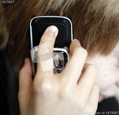 Image of Woman speaking on cellphone