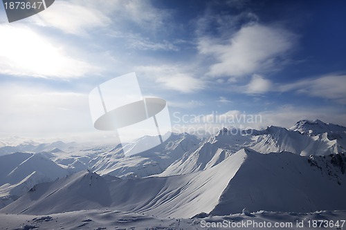 Image of Snowy mountains in evening