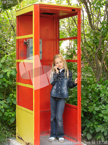 Image of Little girl with mobile phone