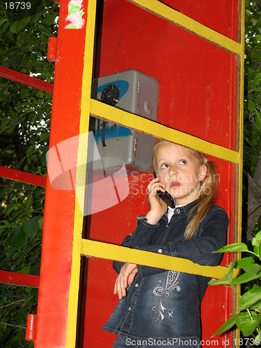 Image of Little girl with mobile phone