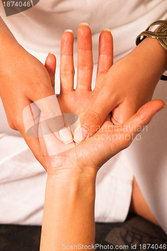 Image of Massaging a palm