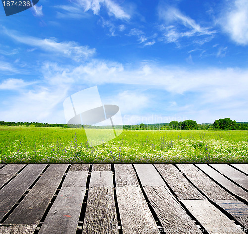 Image of blue sky and wood floor background