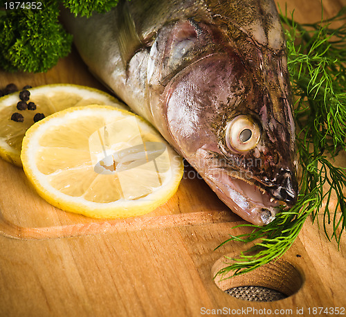 Image of Pike perch on a wooden kitchen board