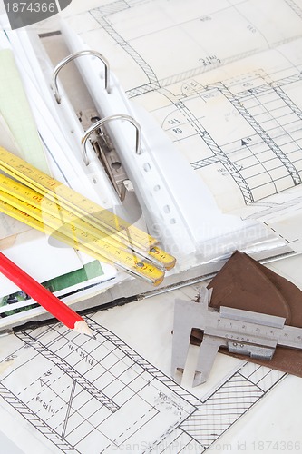 Image of Architectural plans of the old paper measuring tools and file with the project