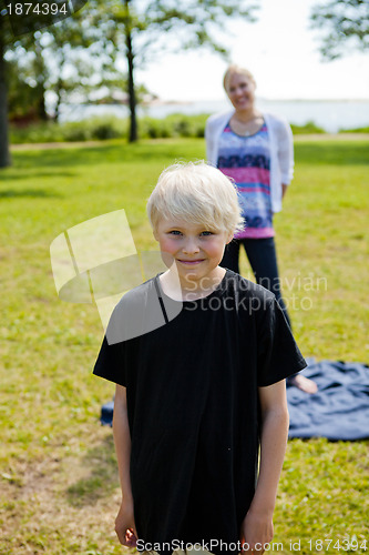 Image of Boy and mother outdoors