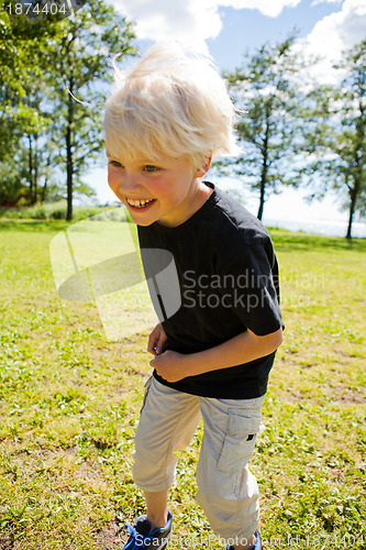 Image of Boy jumping outdoors