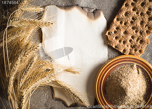 Image of Wheat ears on vintage background 