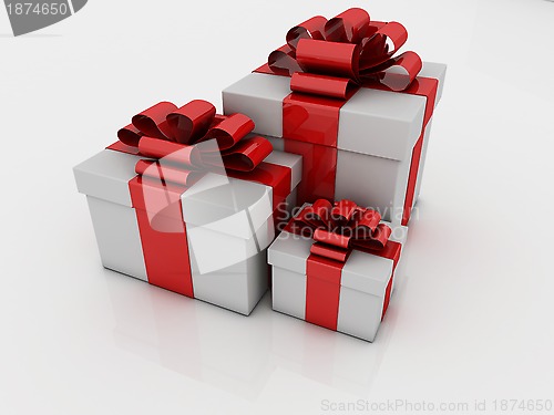 Image of white gift boxes with ribbons and bows isolated on white backgro