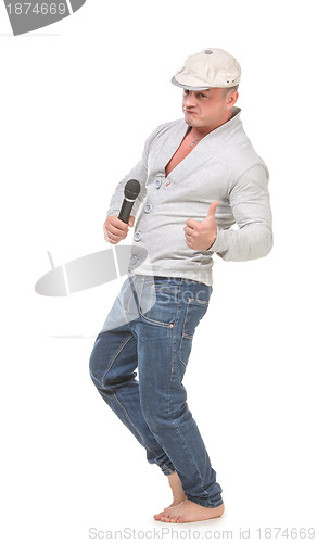 Image of Man in a Cap with a Microphone shows Thumb-up