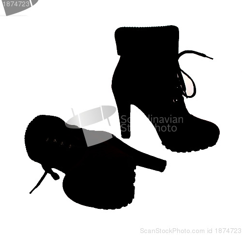 Image of The silhouette of high heeled boots 