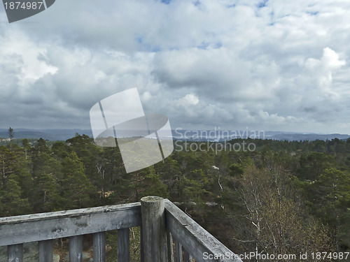 Image of view over forest with cloudy sky