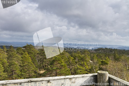 Image of view over forest with cloudy sky