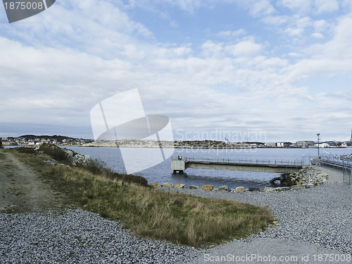 Image of small footbridge under blue sky