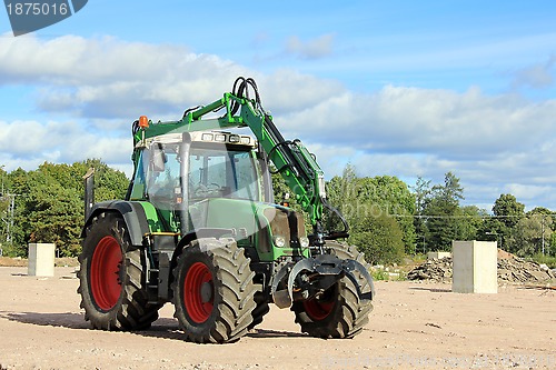 Image of Grapple Tractor at Construction Site